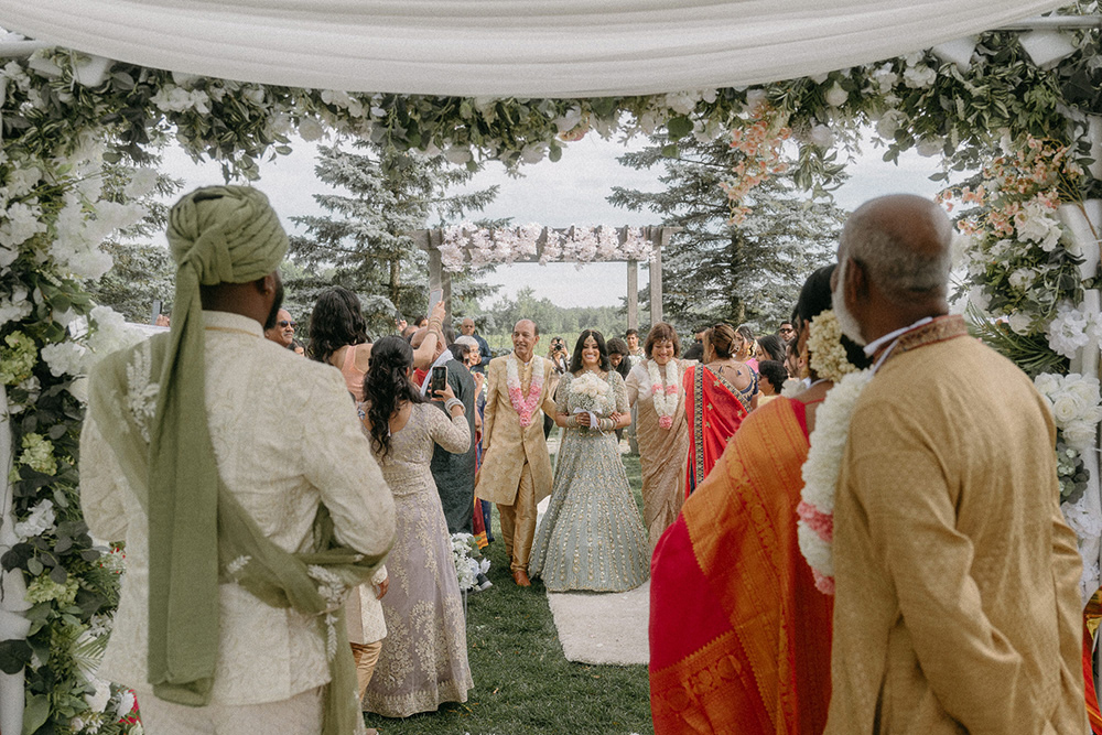 Brides arrives for traditional Indian wedding ceremony
